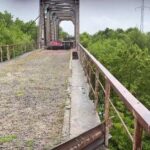 Сбросили с моста