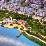 Архитектурный макет жилого комплекса на берегу с пляжем, парком и жилыми домами