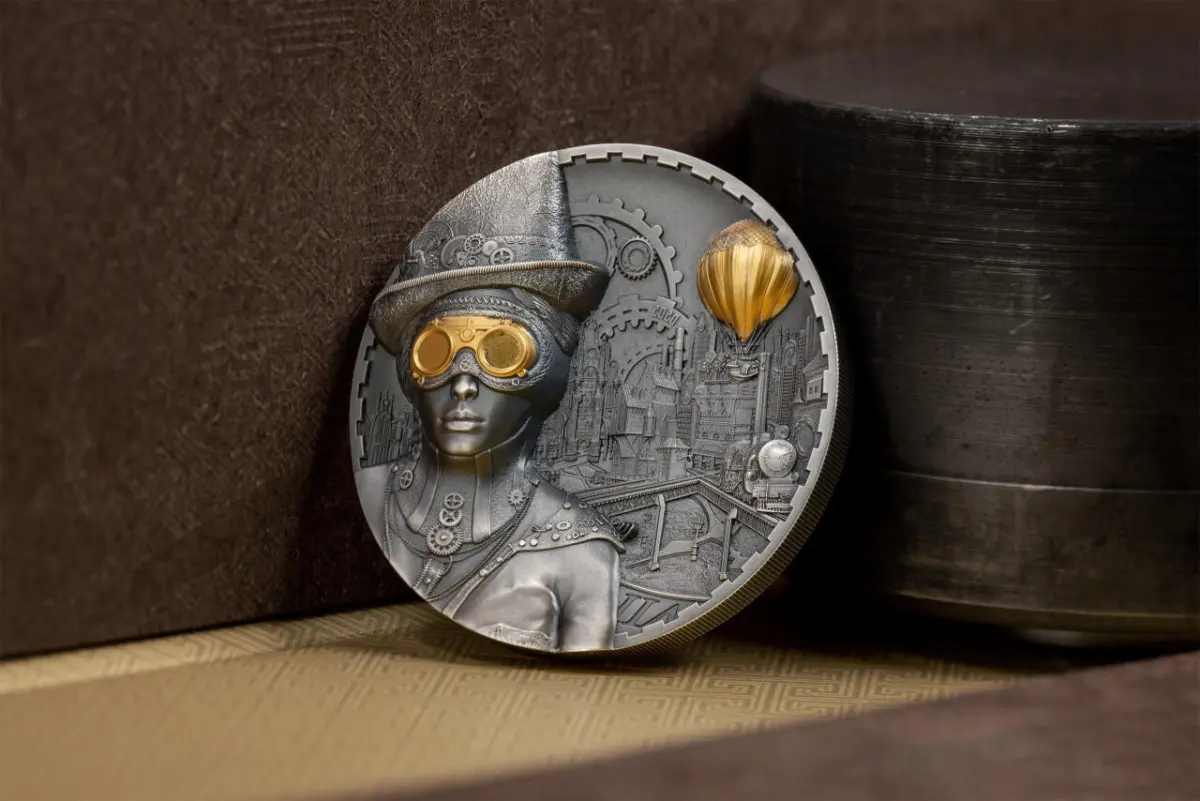 Коллекционная монета «Стимпанк» с женским портретом и дирижаблем.