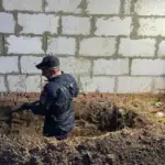 Труп откопали